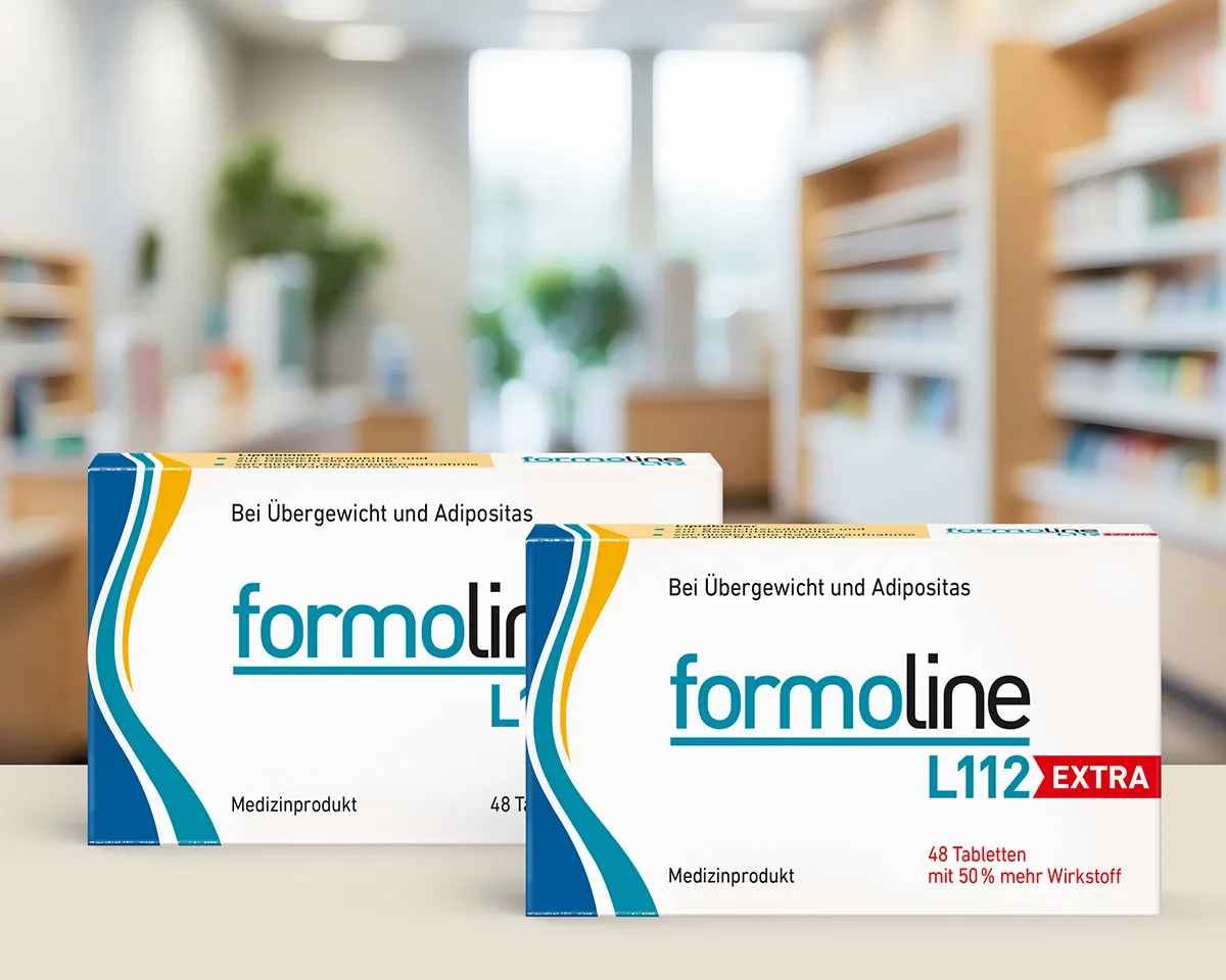 formoline L112 und L112 EXTRA in Apotheke formoline L112 und L112 EXTRA Packungen vor Apothekenregalen.